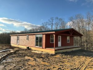 Log Double Wide Cottage Premier (Gable Porch)