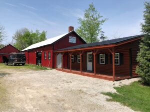 Log Double Wide Cottage Premier (Eave Porch)