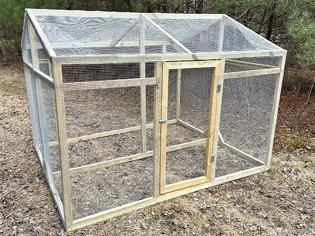 run/pen with 6’ gable ridge design fully wrapped in ½” hardware cloth